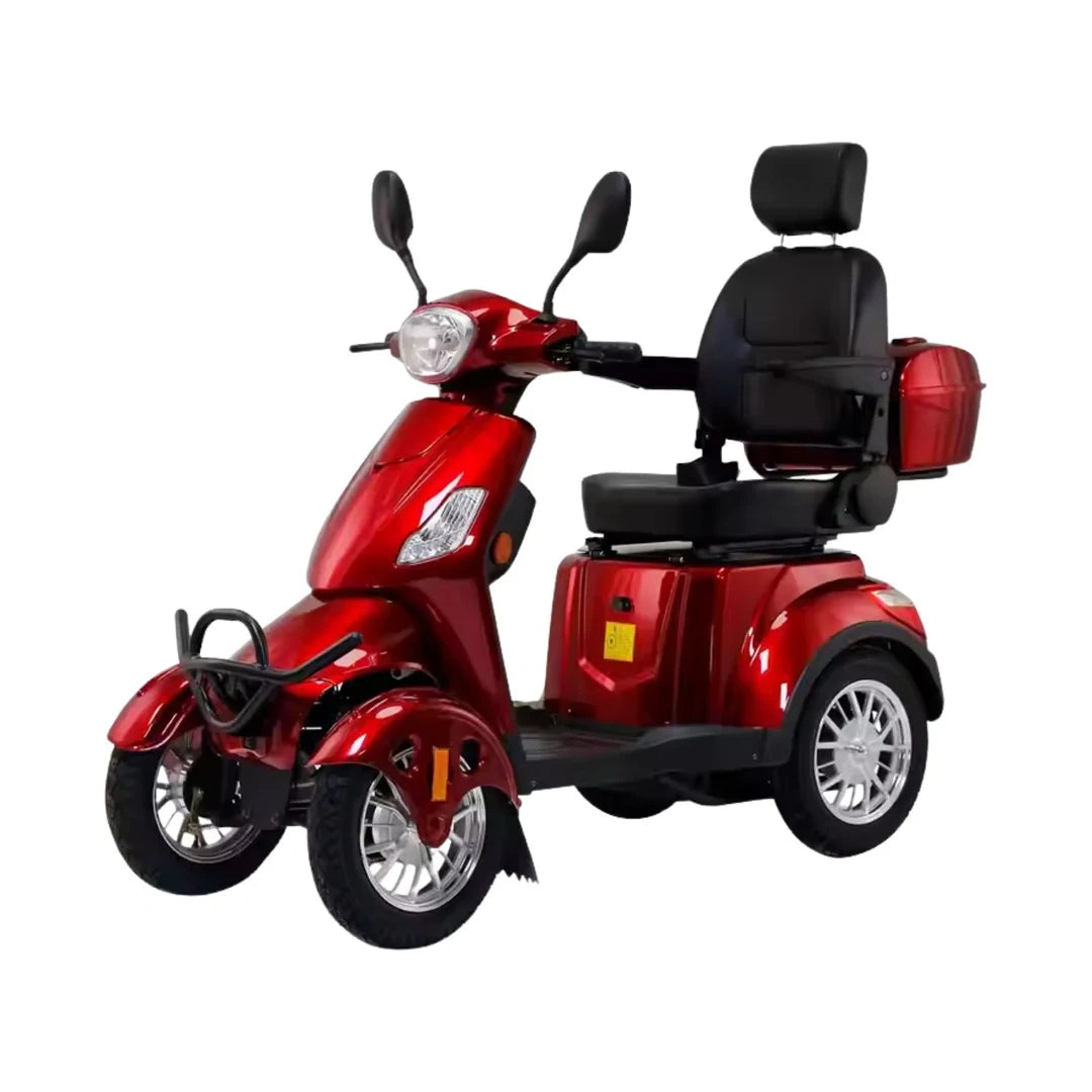 Red three-wheeled mobility scooter on a white background