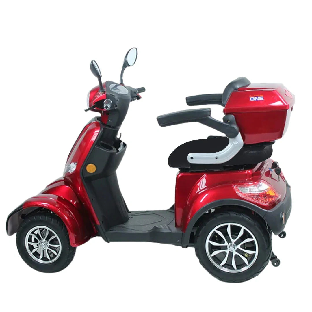 Red mobility scooter on a white background