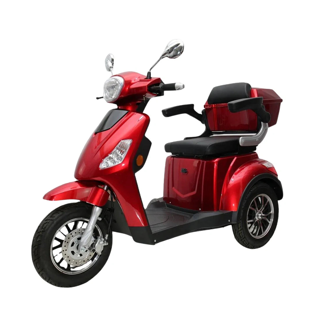 Red three-wheeled scooter on a white background