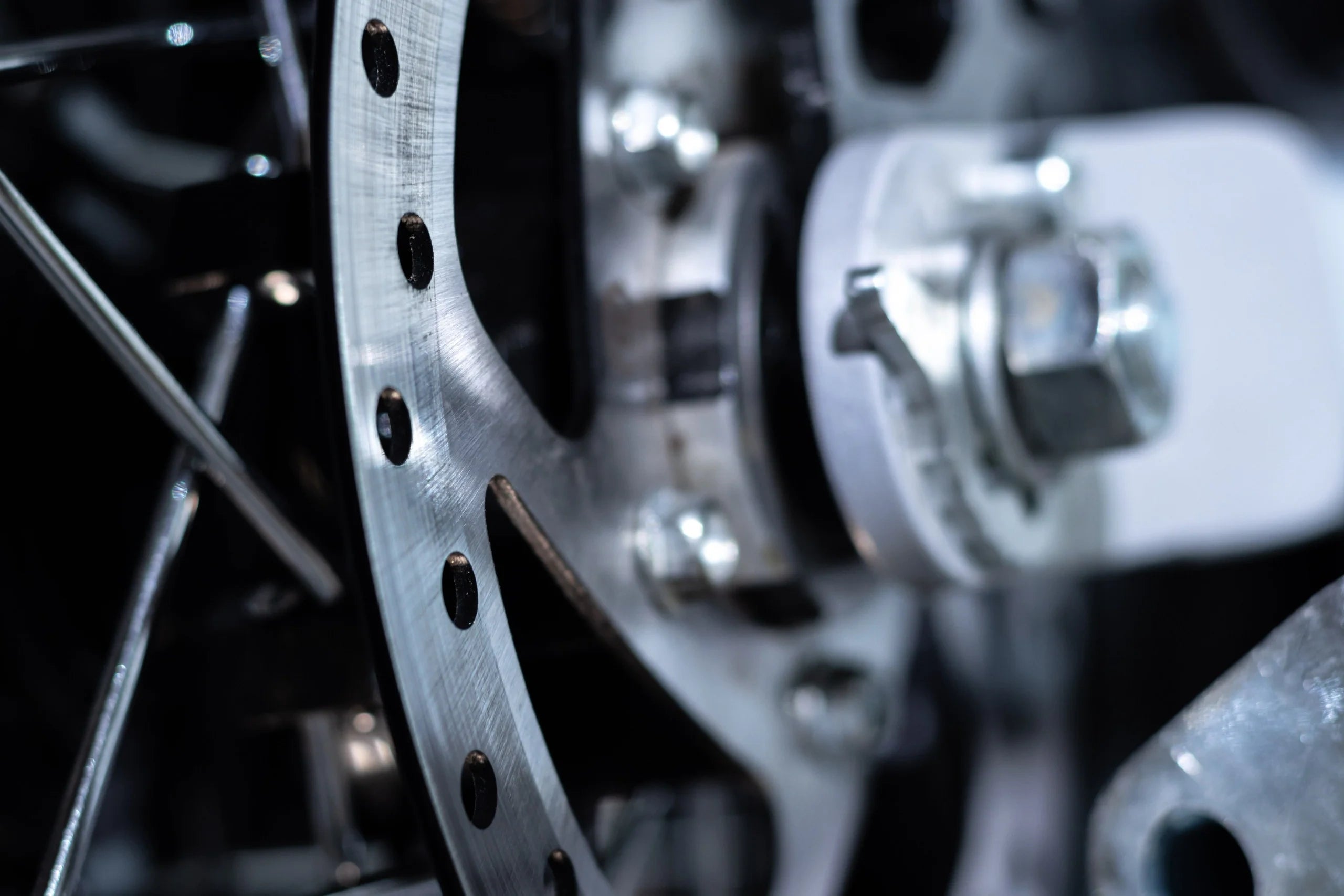 Close-up of a motorcycle wheel with metallic components