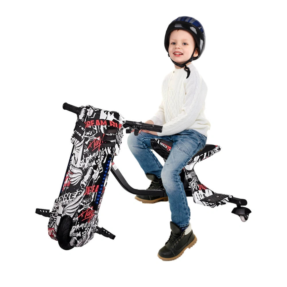 Child sitting on a toy motorcycle with a helmet on a white background