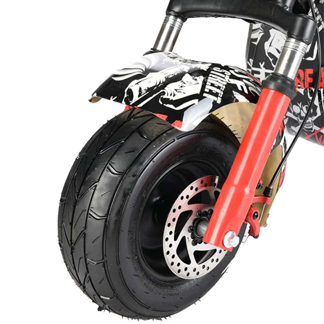 Close-up of a scooter wheel with red suspension fork on a white background
