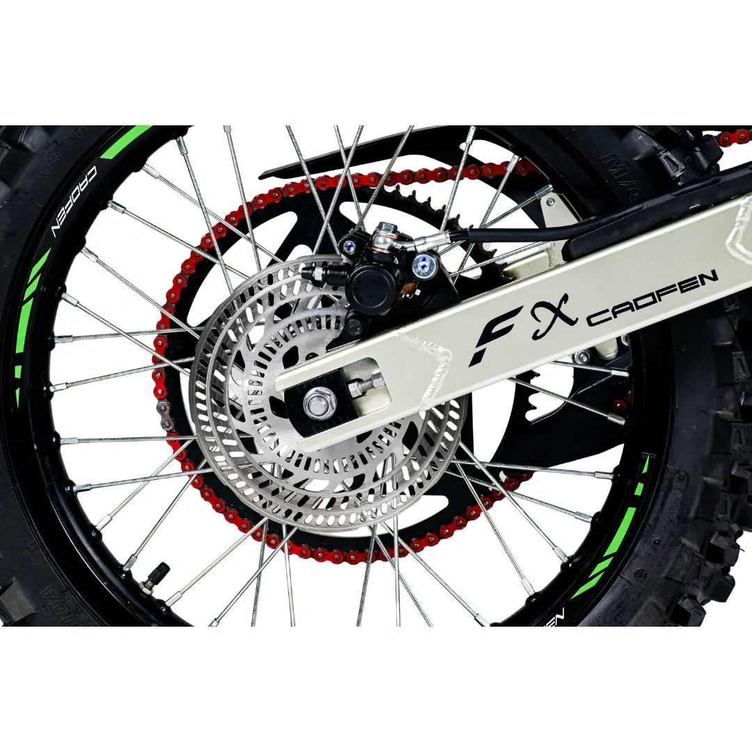 Close-up of a motorcycle wheel with 'FX' branding on a white background