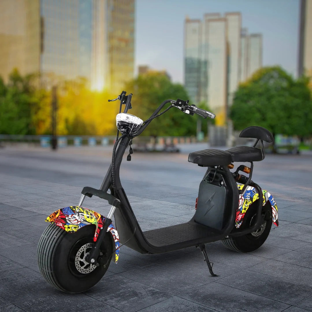Black electric scooter with colorful design on wheels in an urban setting