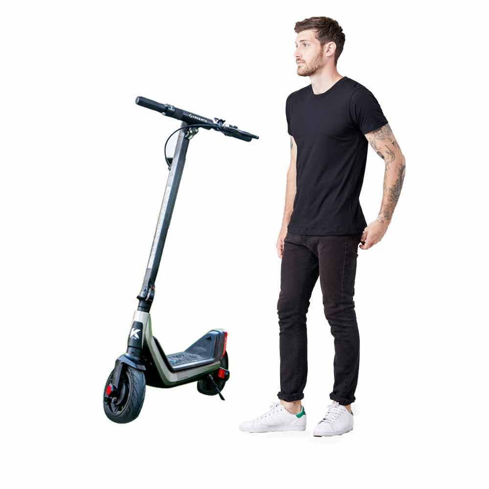 Man standing next to a black electric scooter on a white background