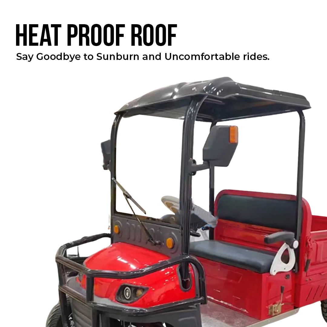 ocean cartz close-up promotional image highlighting the heat proof roof on a red utility electric vehicle with a flatbed. The shot focuses on the black roof and the driver's cabin, with text promoting the heat proof roof for comfort and sun protection. This view emphasizes the all-weather features of the two-seater work cart, including the black brush guard and small windshield wiper.