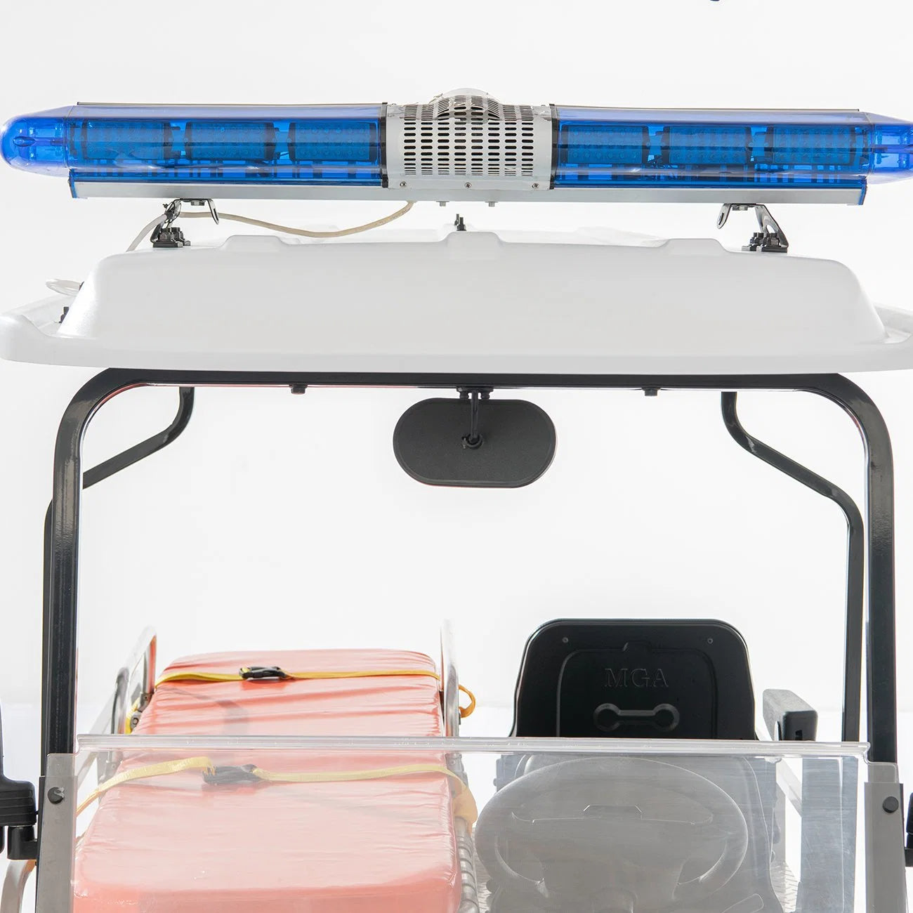 ocean cartz interior-facing close-up of the emergency light bar mounted on the white roof of an ambulance golf cart. The long, blue LED emergency light bar is prominently displayed. Below, the interior shows the top of the orange stretcher pad with yellow restraints, the black driver's seat, the steering wheel, and the rear view mirror, emphasizing the essential equipment of this medical utility vehicle for emergency response.