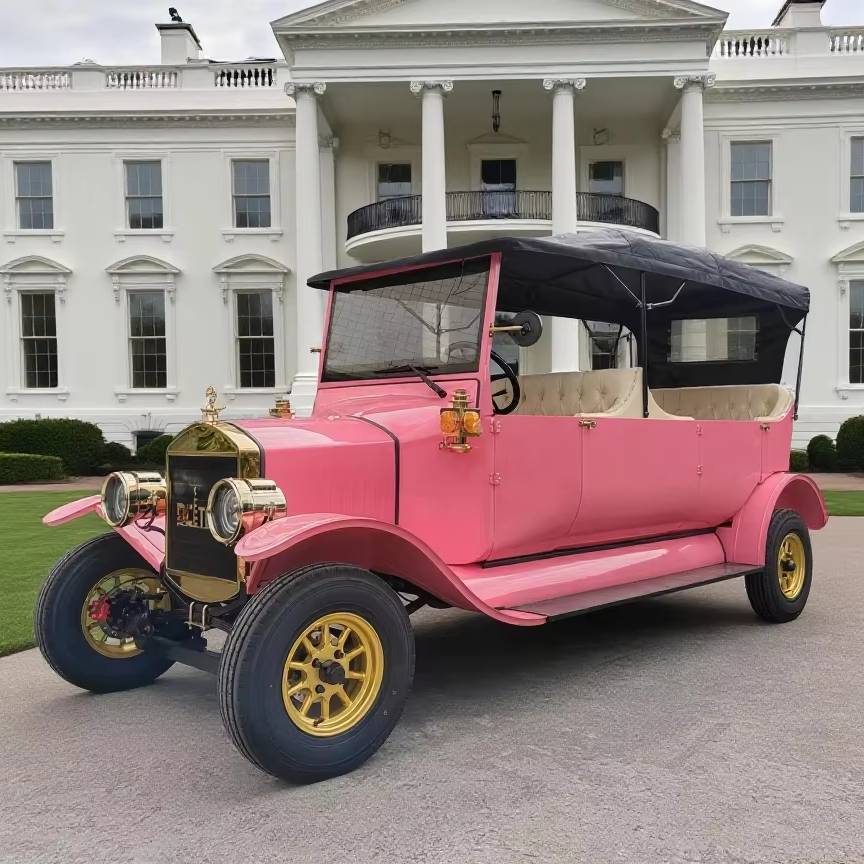 Vintage pink car in front of a large white building with columns
