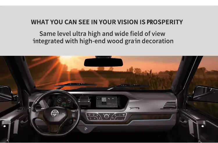 Car interior with dashboard and steering wheel, featuring a scenic view through the windshield.