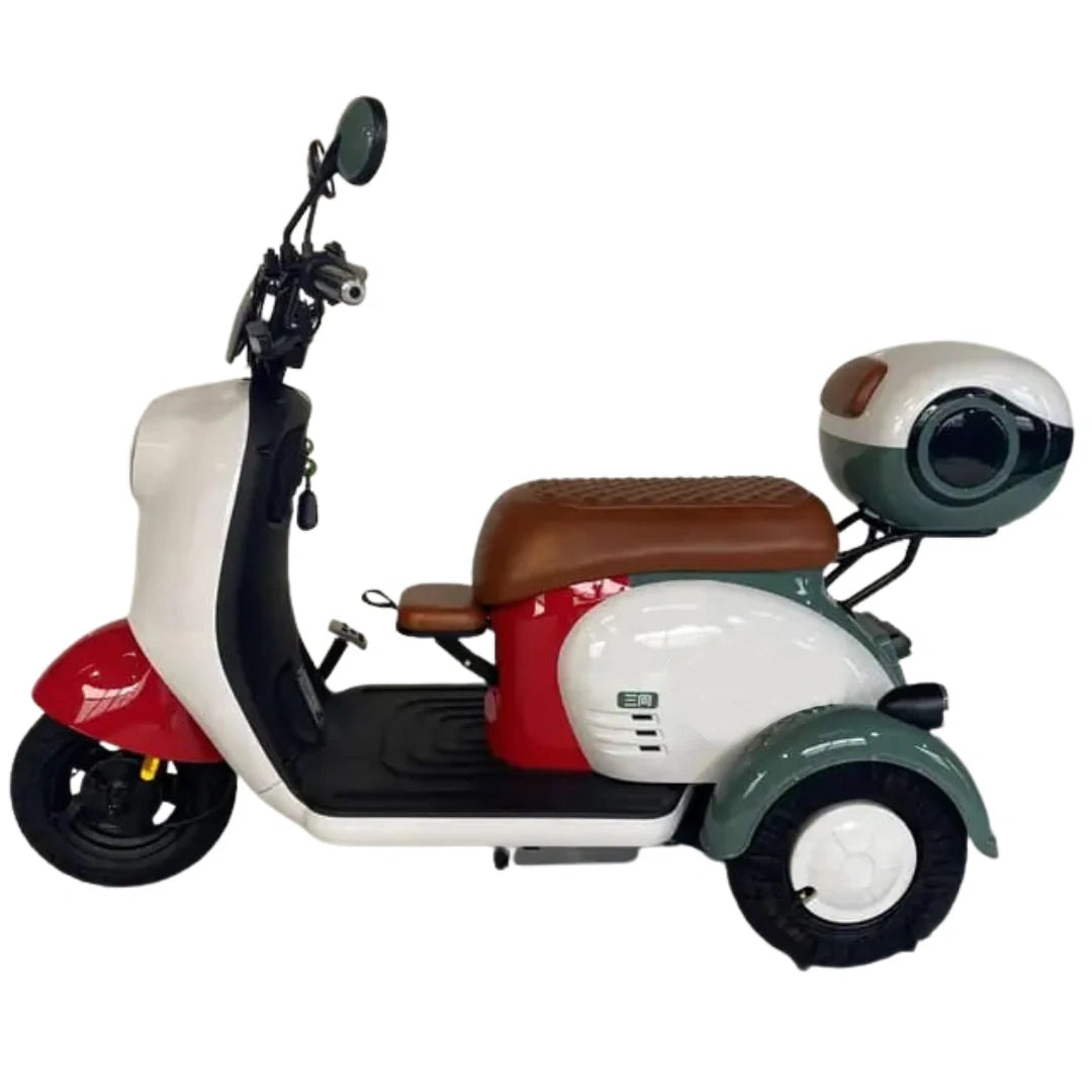 ocean cartz side profile of a compact three wheel electric scooter in a clean white, red, and green color scheme, featuring a brown textured seat and a unique round storage box mounted at the back. This retro style urban mobility vehicle is designed for casual commuting and stable, easy-to-ride personal transport.