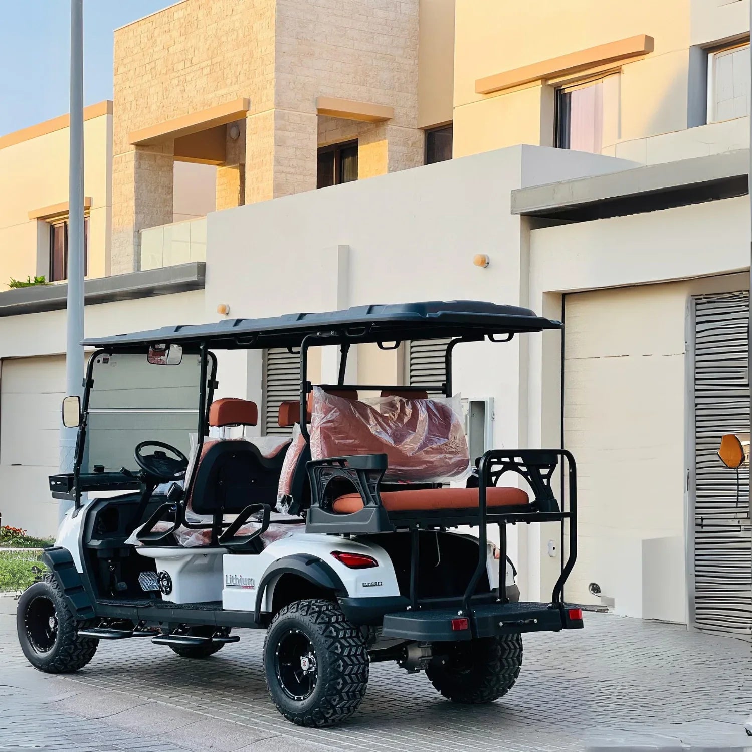 Golf cart parked in front of a building