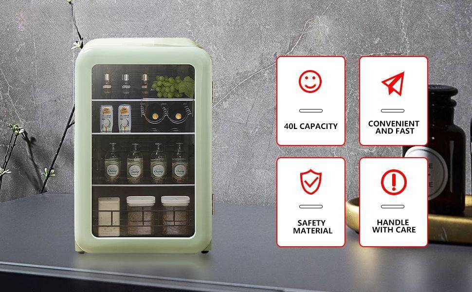 Small appliance with digital display on a gray surface, featuring icons and text about capacity, convenience, safety, and handling.