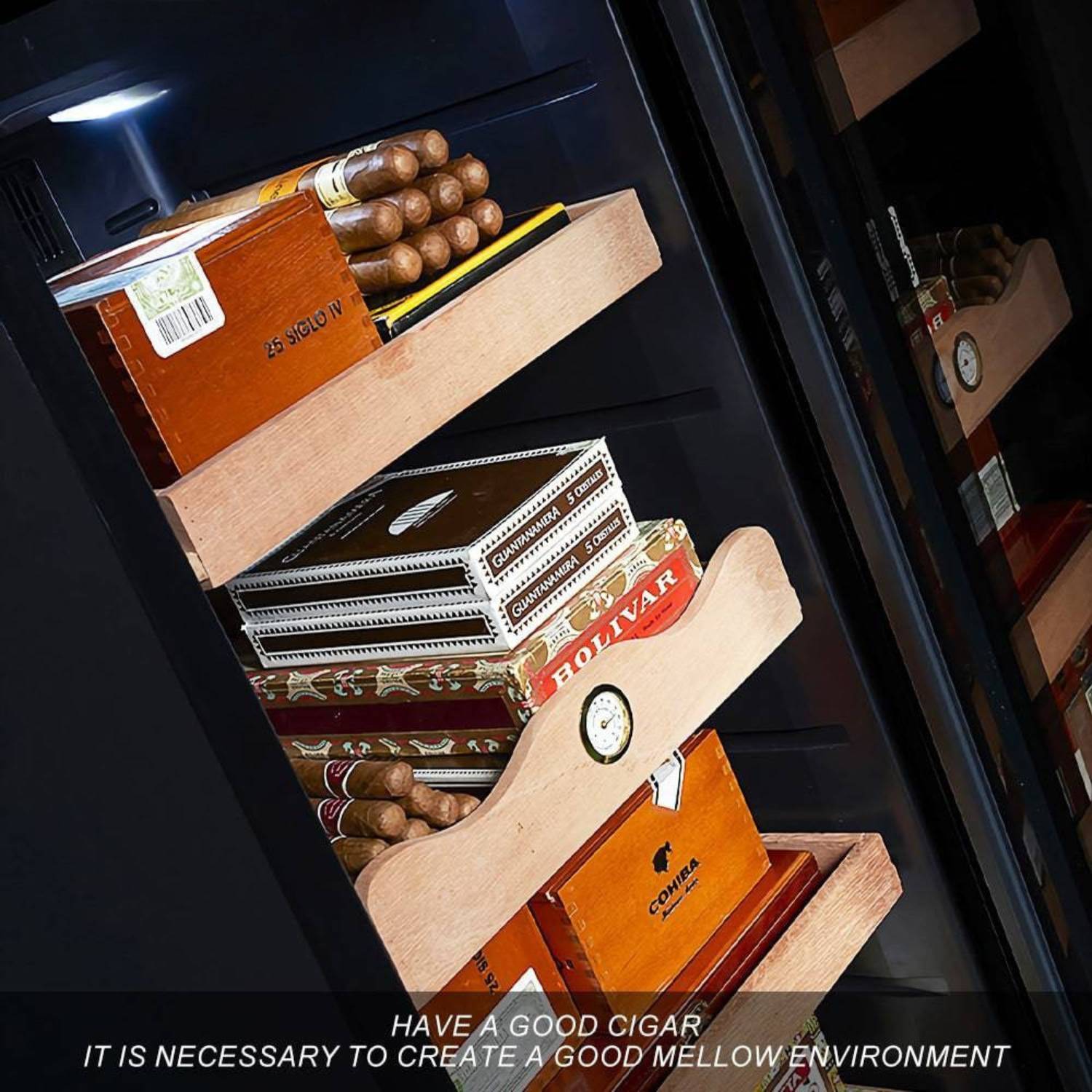 Cigar boxes and tools inside a humidor with cigars.