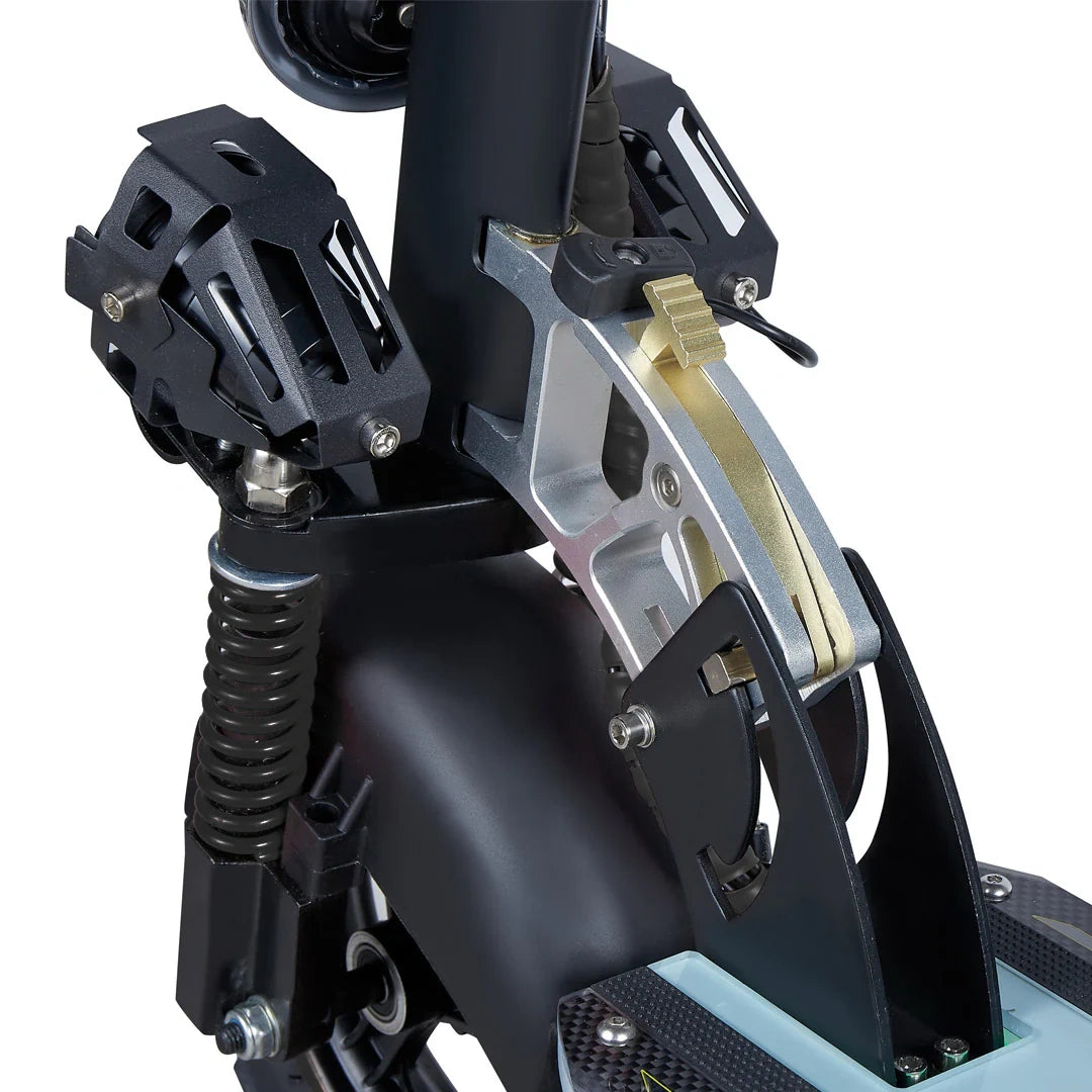 Close-up of a mechanical device with black and metallic components on a white background