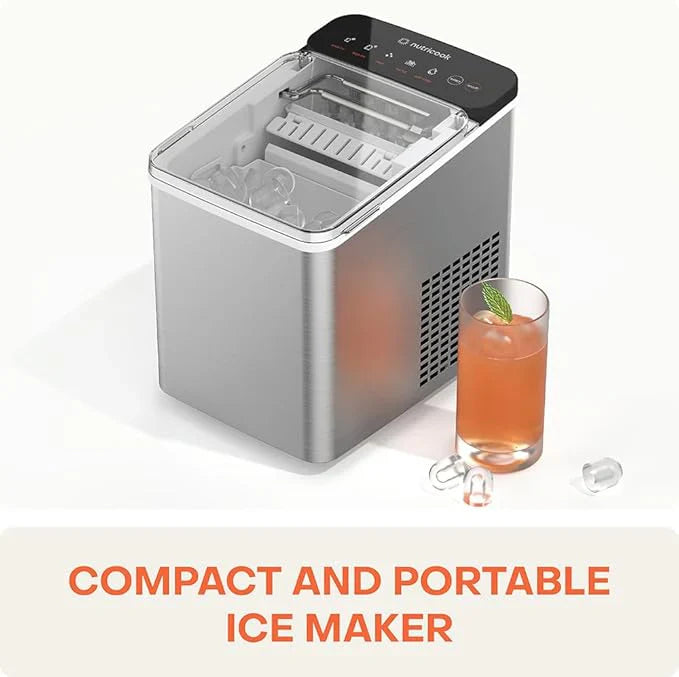 Compact and portable ice maker with a glass of iced drink on a white background