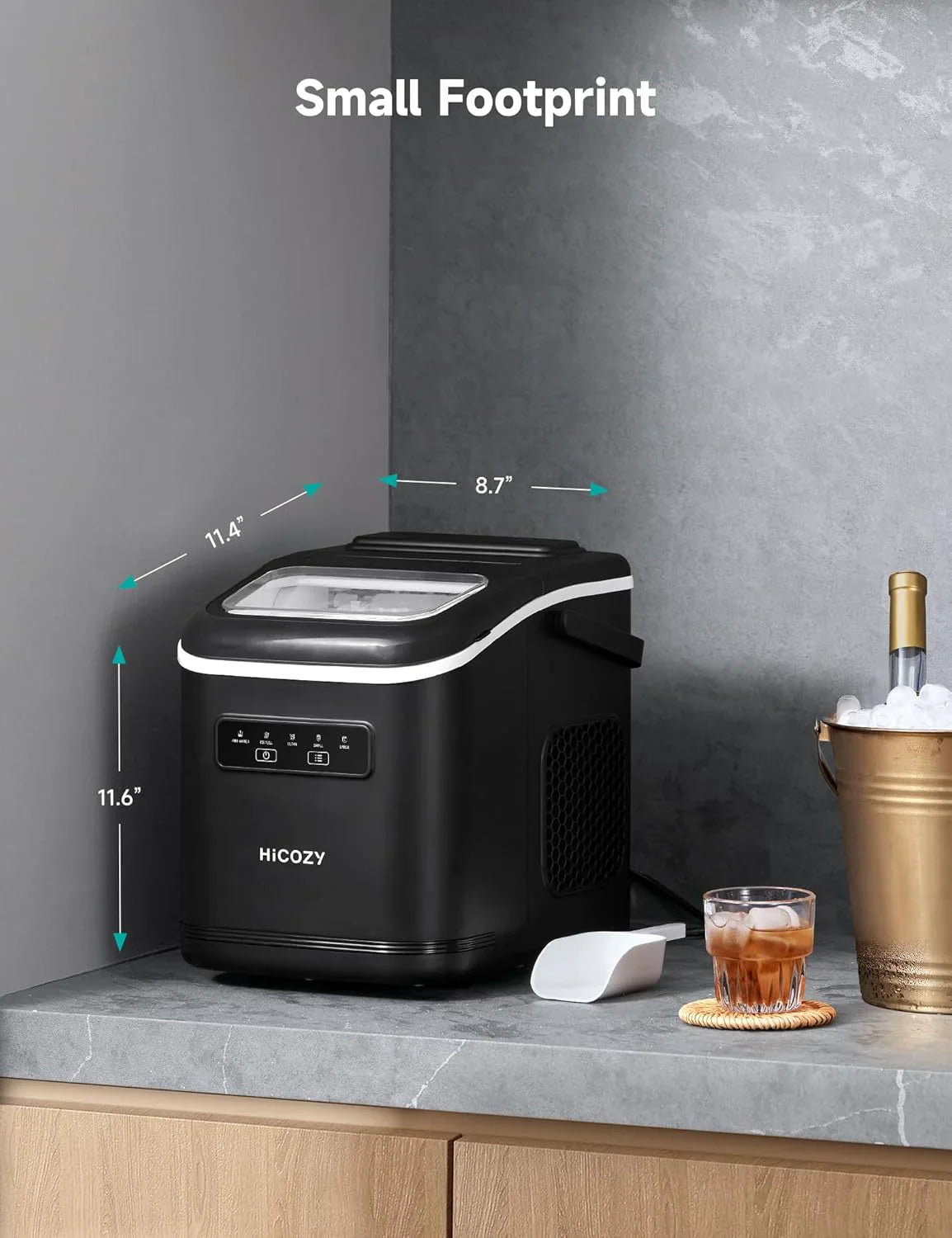 Black ice maker on a countertop with measurements and a glass of iced drink.