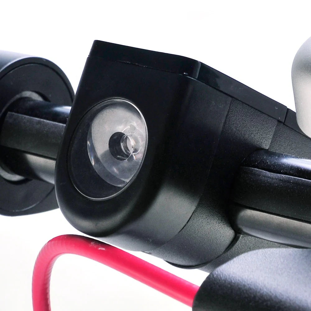 Close-up of a black suction cup mount on a white background