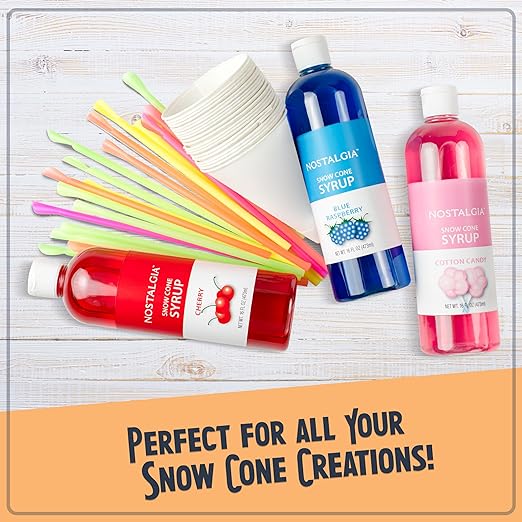 Nostalgia snow cone syrup bottles with colorful straws on a light wooden surface.