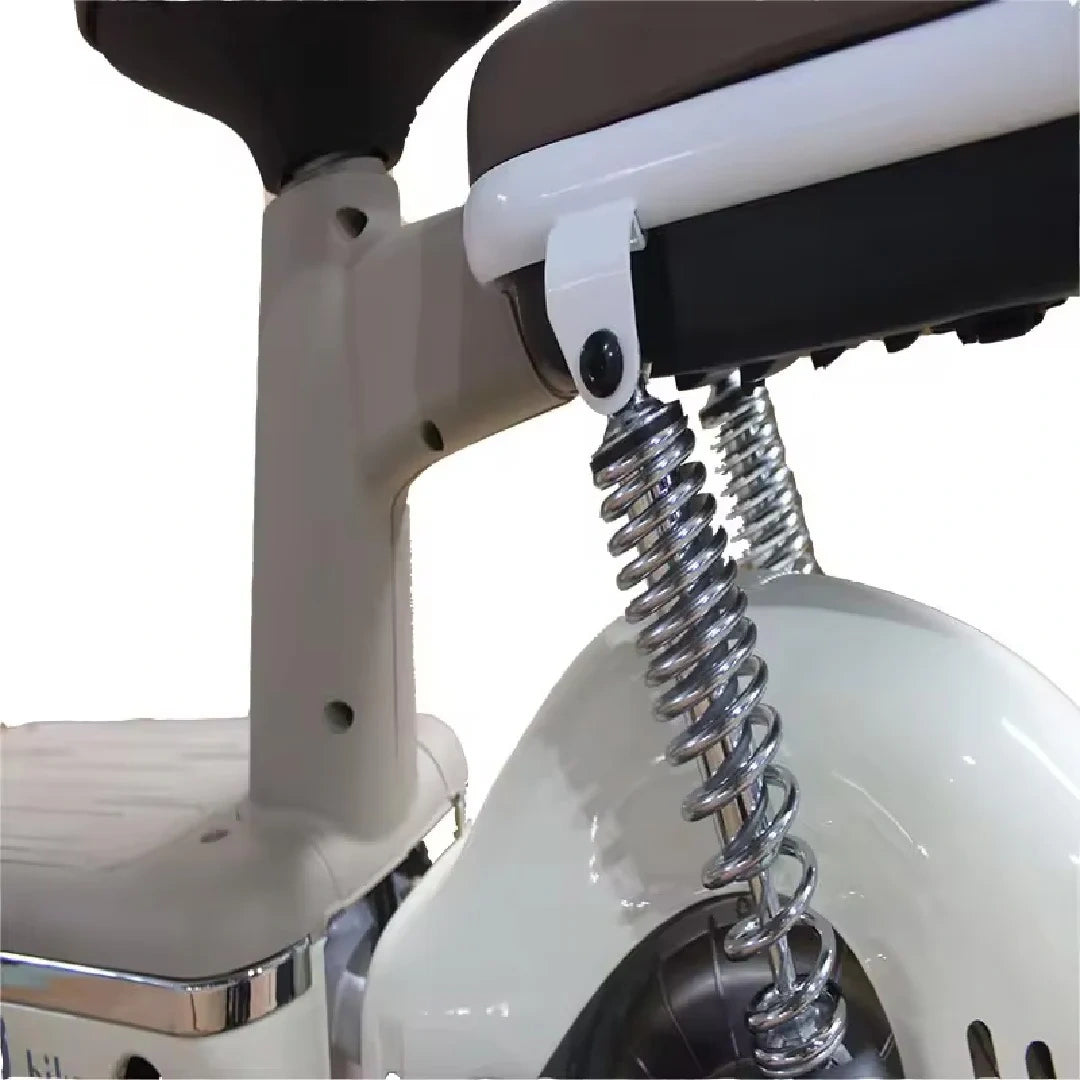 Close-up of a scooter's suspension system with a spring on a white background