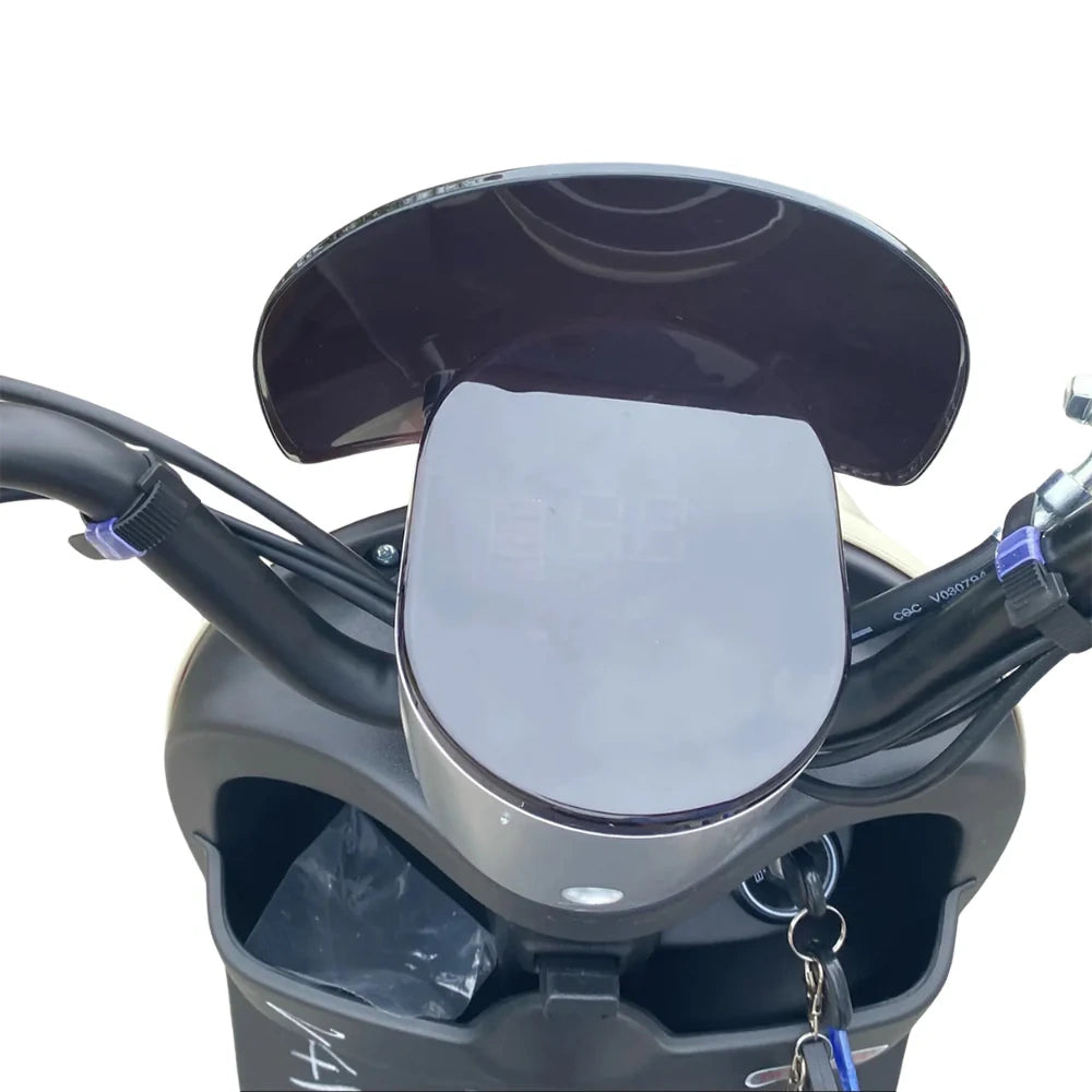 Motorcycle seat with a black cover on a white background