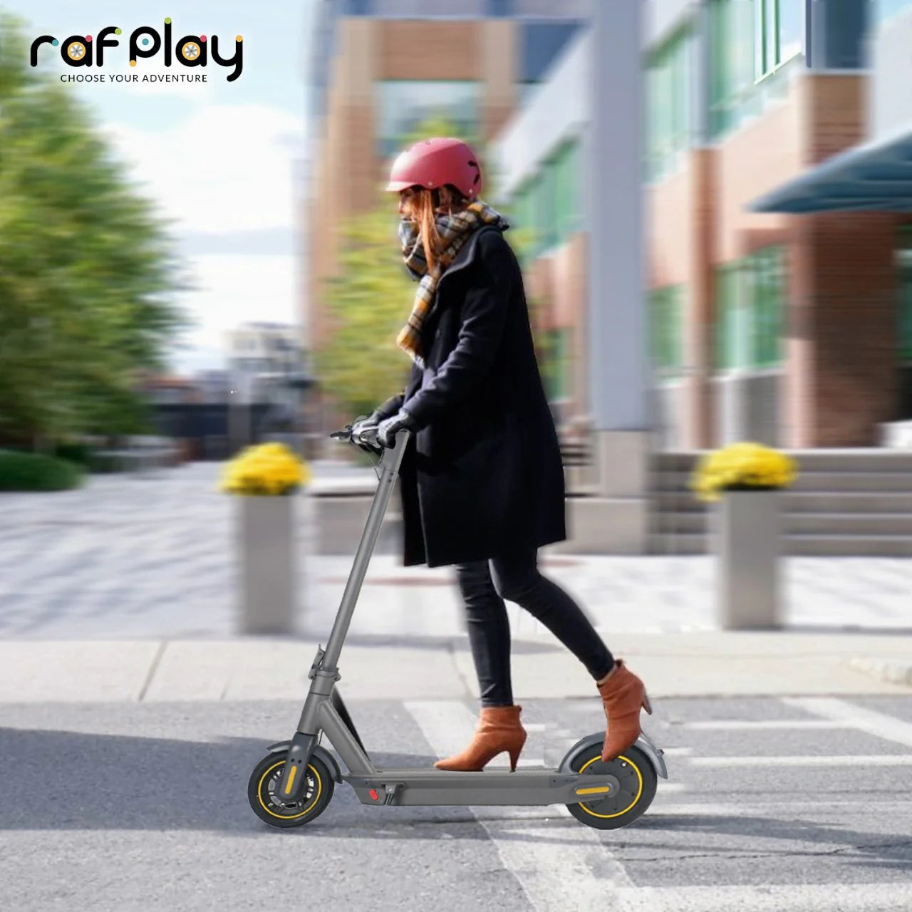 Person riding a scooter on a city street with 'raf play' branding.