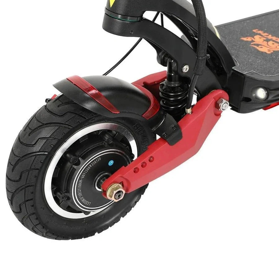 Close-up of an electric scooter's wheel and suspension system on a white background