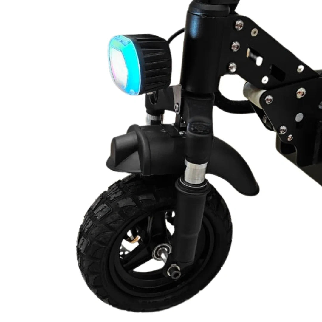 Close-up of a scooter wheel with a light on a white background