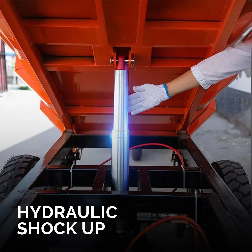 Person adjusting a hydraulic shock on a vehicle with text 'HYDRAULIC SHOCK UP'.