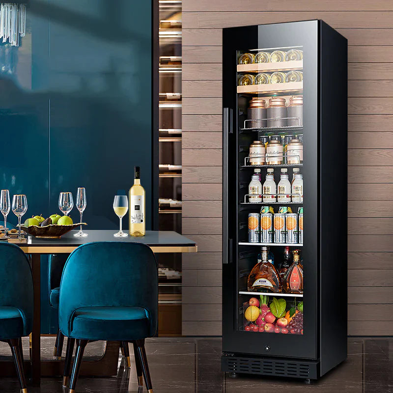 Black wine cooler with drinks and fruits in a modern kitchen setting