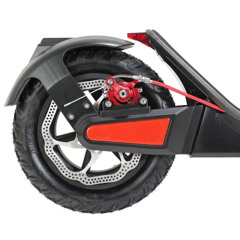 Close-up of a scooter wheel with red accents on a white background