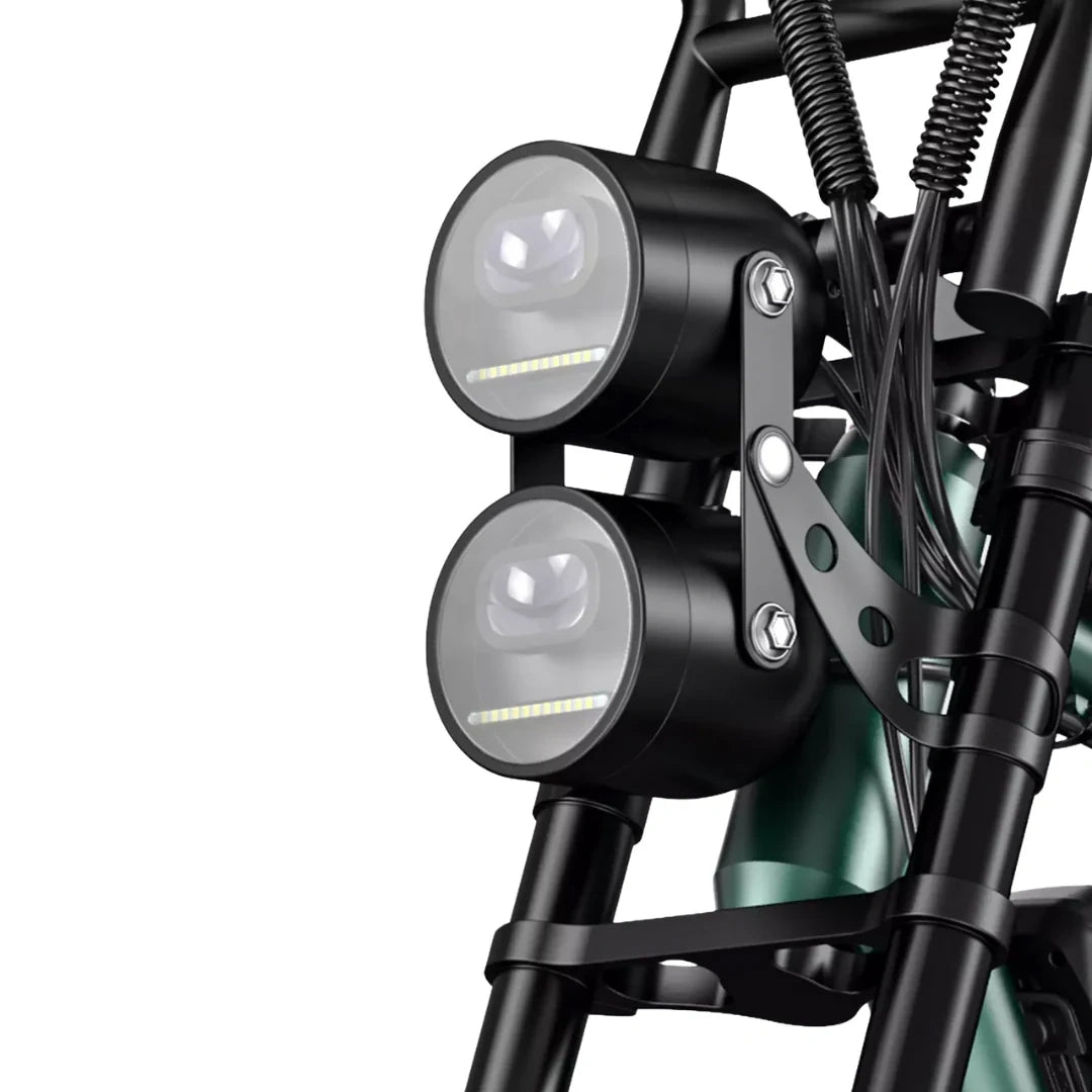 Close-up of a motorcycle's front lights and suspension on a white background