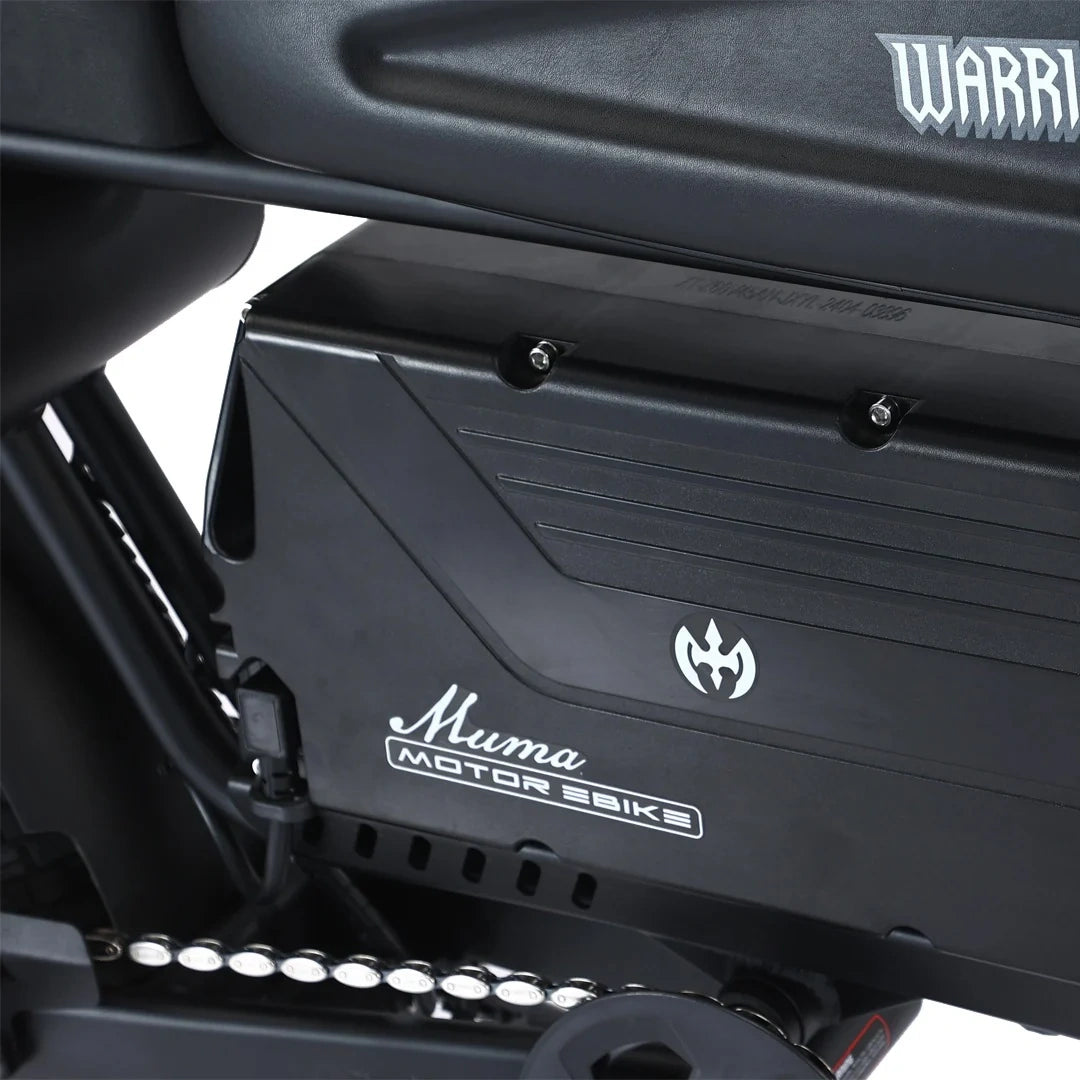 Close-up of a black Warrior and Muma Motorbike product with branding.