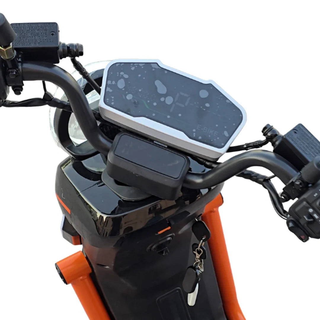 Close-up of a motorcycle handlebar with a digital display and control panel.