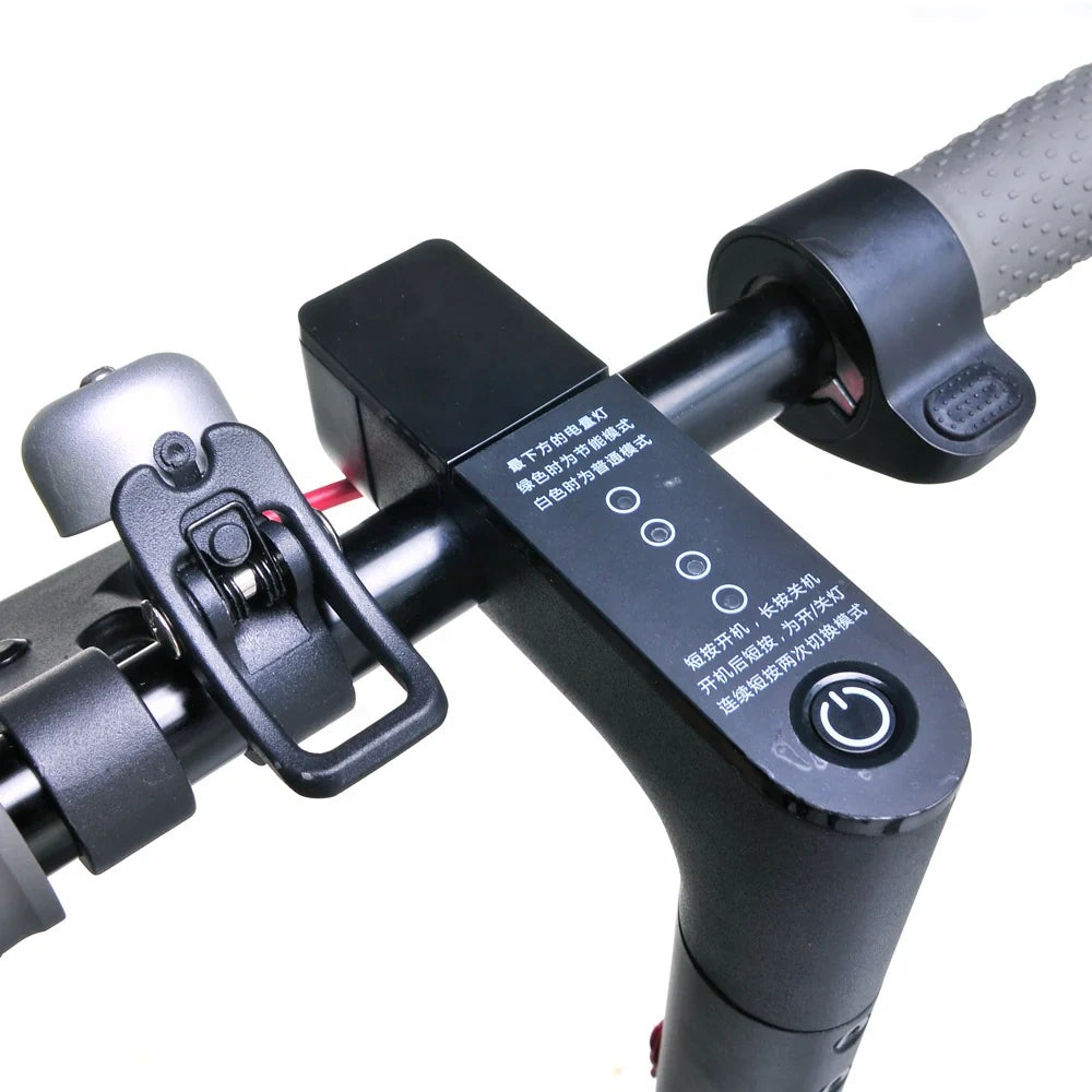 Close-up of a scooter handlebar with control buttons and brake lever on a white background