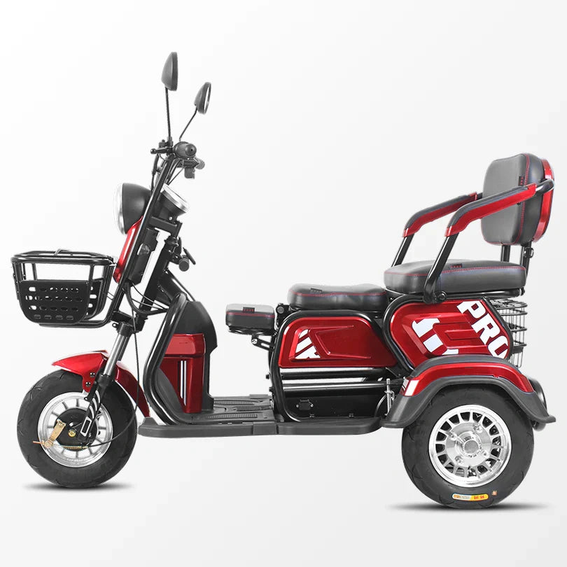 Red and black three-wheeled electric scooter on a white background