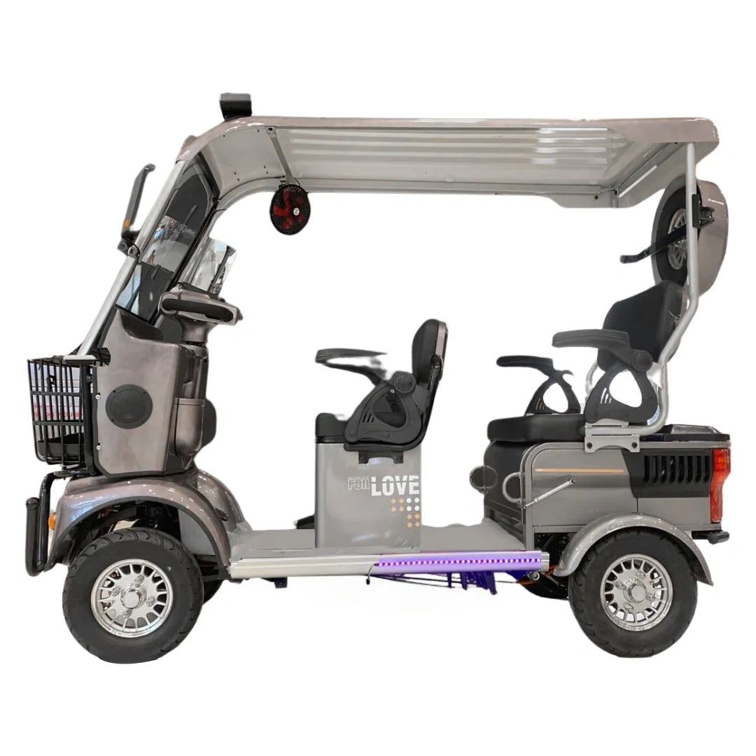 Gray electric vehicle with a transparent roof on a white background