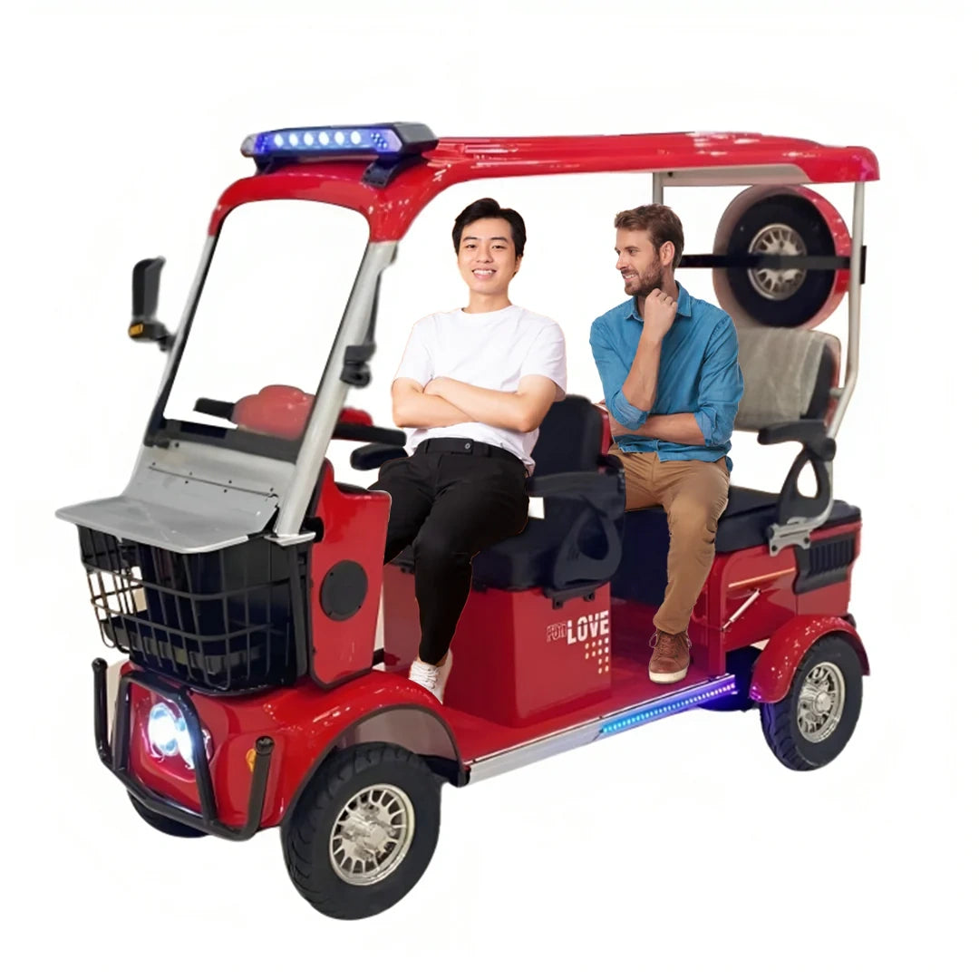 Two people sitting in a red electric vehicle on a white background