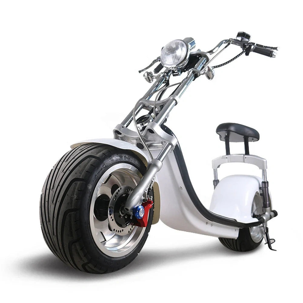 Motorized scooter with large front wheel on a white background