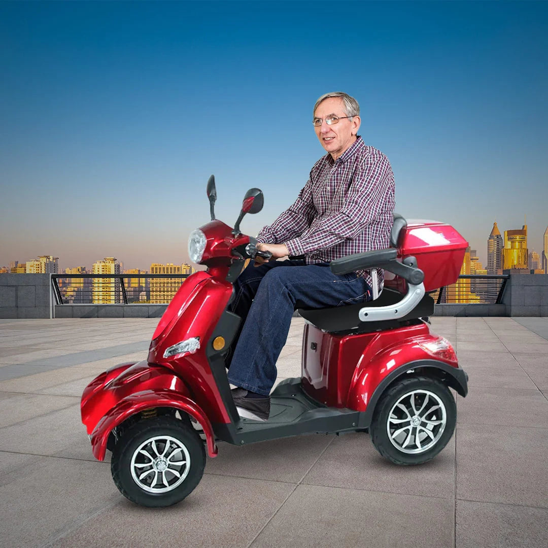 Man sitting on a red mobility scooter with a cityscape in the background