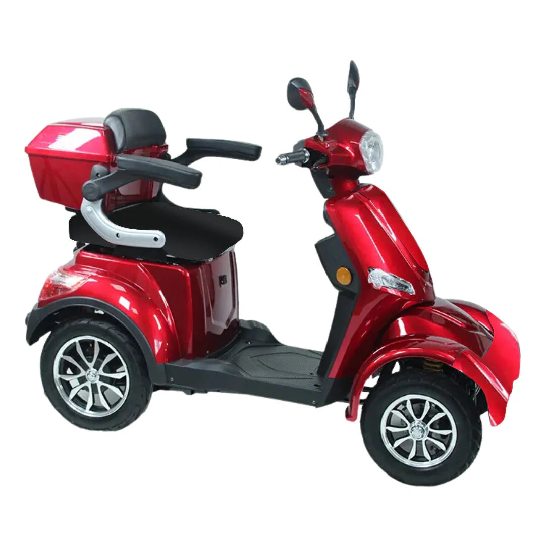 Red three-wheeled mobility scooter on a white background