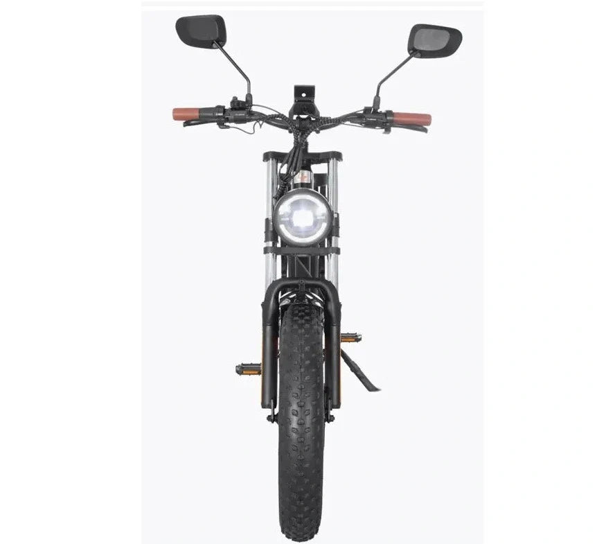 Front view of a black electric bike with headlight on a white background