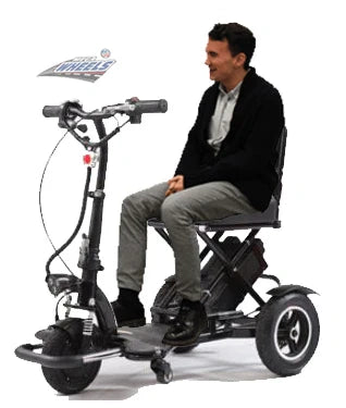 Man sitting on a mobility scooter with a visible brand logo in the corner.