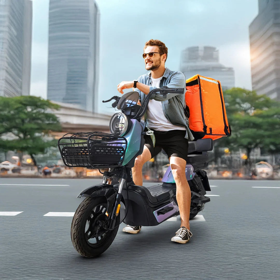 Man on a scooter with an orange delivery bag in an urban setting