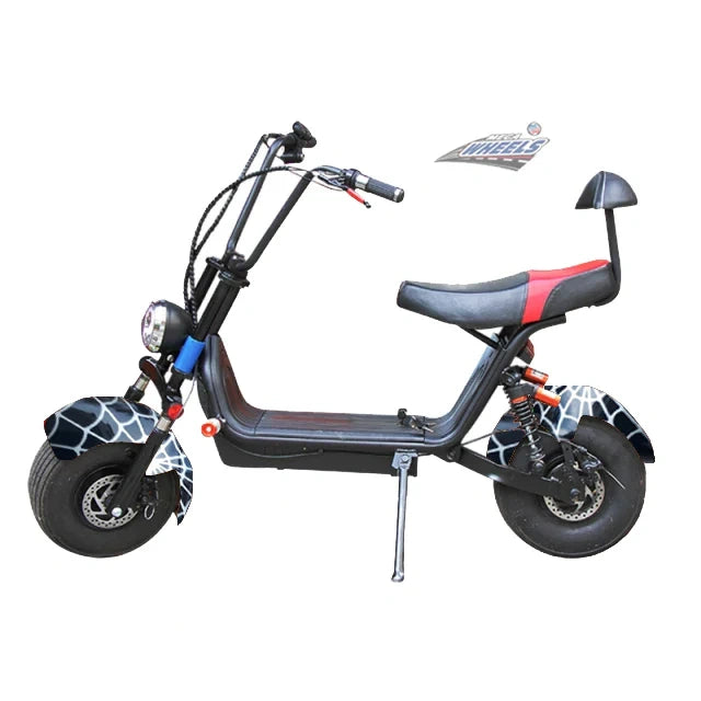 Small electric scooter with unique tire design on a white background