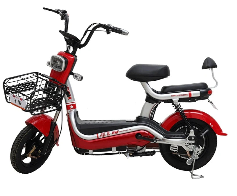 Red electric bike with a black seat and basket on a white background