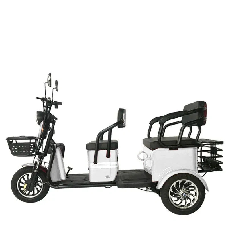 White three-wheeled electric vehicle with black seats and basket on a white background