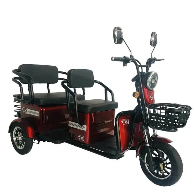 Red electric tricycle with a basket on a white background