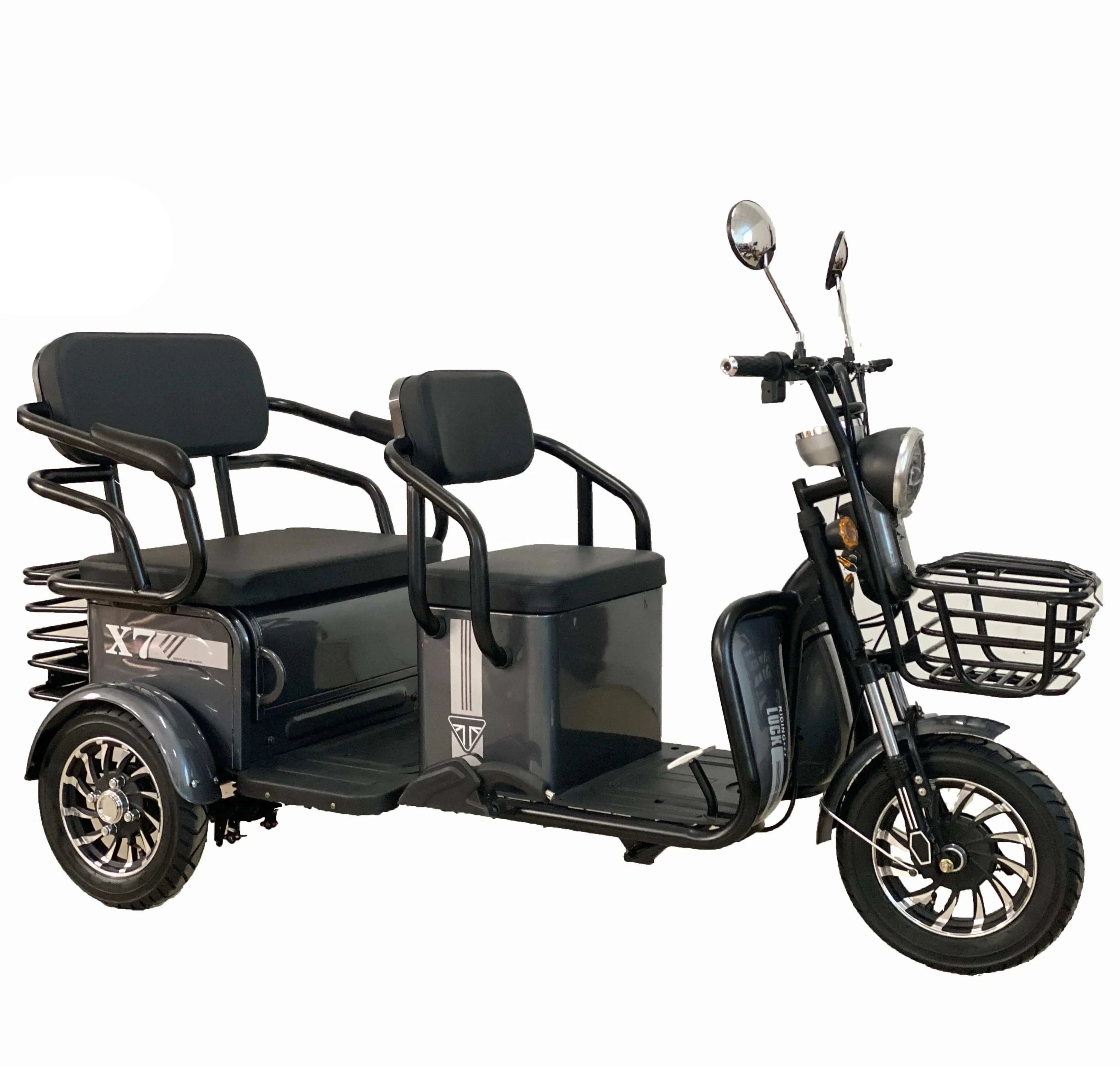 Black electric tricycle with a basket on a white background