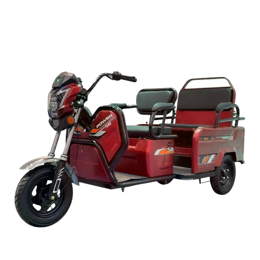 Red electric tricycle with a cargo area on a white background