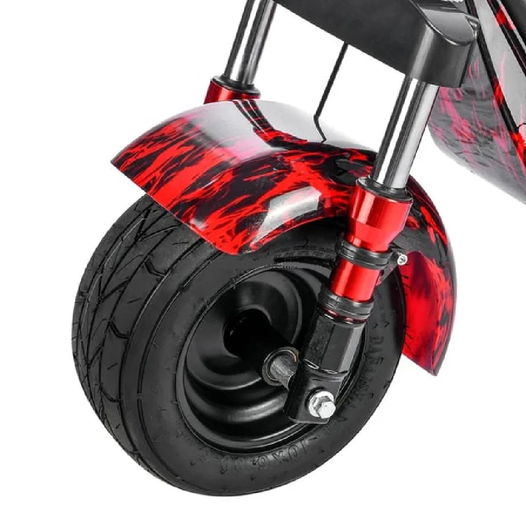 Close-up of a scooter wheel with red and black design on a white background